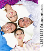 Four happy business people