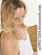 Woman wearing white tank top