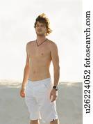 Man wearing shorts on beach