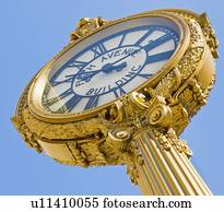 Antique clock against clear sky