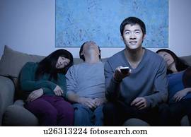 Family watching TV