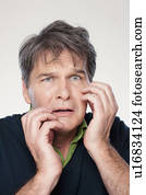 Studio portrait of mature man with facial expression