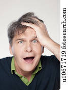 Studio portrait of mature man with facial expression