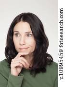 Studio portrait of mature woman with facial expression
