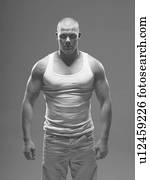 Athlete wearing tank top indoors