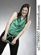 Smiling woman in sleeveless blouse