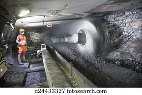 Coal miner working in mine