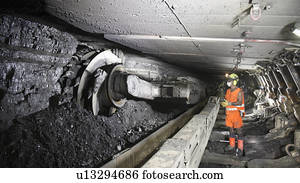 Coal miner working in mine