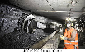 Coal miner working in mine