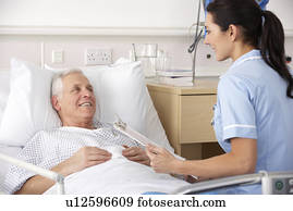 Nurse and male patient in UK Accident and Emergency