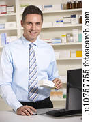 UK pharmacist at work