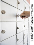 Woman opening safety deposit box