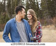 Portrait of young couple in non-urban scene