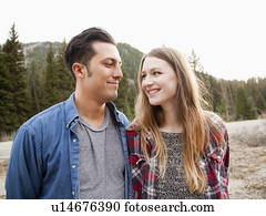Portrait of young couple in non-urban scene