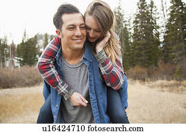 Portrait of young couple in non-urban scene