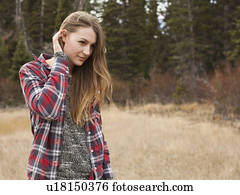 Portrait of young woman in non-urban scene