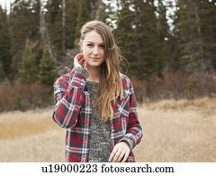 Portrait of young woman in non-urban scene