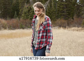 Portrait of young woman in non-urban scene