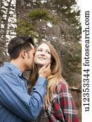 Young couple in non-urban scene