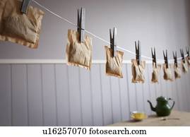 Teabags hanging from clothesline