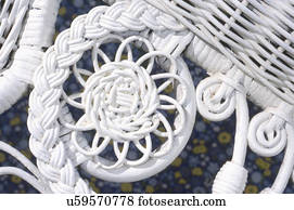 Extreme close-up of white wicker furniture