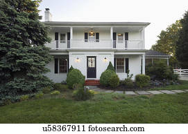Front exterior of colonial style home; Potomac; Maryland; USA