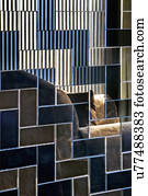 Reflective mosaic tile wall