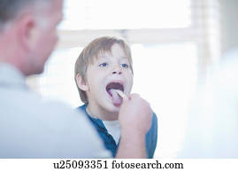 Stock Photo of Girl sticking her tongue out is09a63yh ...