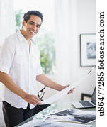 Portrait of man in his photography studio