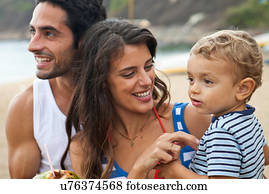 Parents with young son, close up