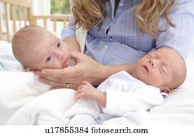 Mother and two week old twins