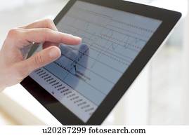 Nurse using a tablet computer