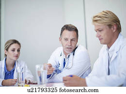Group of doctors holding a meeting in conference room