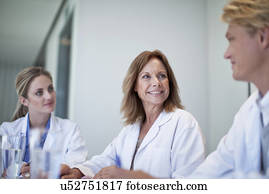 Small group of doctors meeting in the conference room