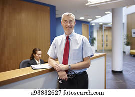 Doctor standing in hospital waiting room