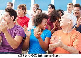 Audience Applauding At Outdoor Concert Performance