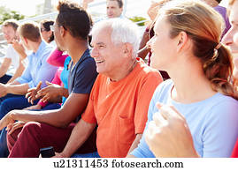 Audience Cheering At Outdoor Concert Performance