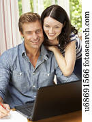 Couple Working In Home Office