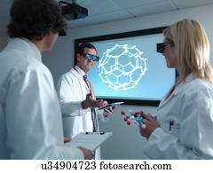 Scientists and apprentice in 3D glasses in meeting in front of molecular model on 3D screen