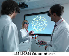 Scientists and apprentice in 3D glasses in meeting in front of molecular model on 3D screen