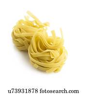 Tagliatelle against a white background.