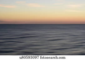 Horizon over water at dusk