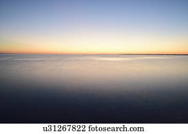 Horizon over water at dusk
