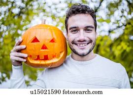 homem, com, dia das bruxas, abóbora