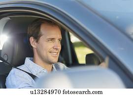 Mid adult man in car
