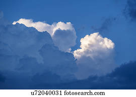 Cumulus clouds on sky
