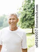 Man in white t-shirt smiling