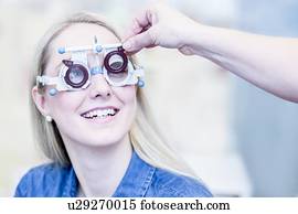 optometrist, examinando, mulher, visão