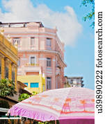 Cuba, Havana, Colonial architecture and sunshade in foreground