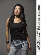 Portrait of brunette woman wearing black tank top